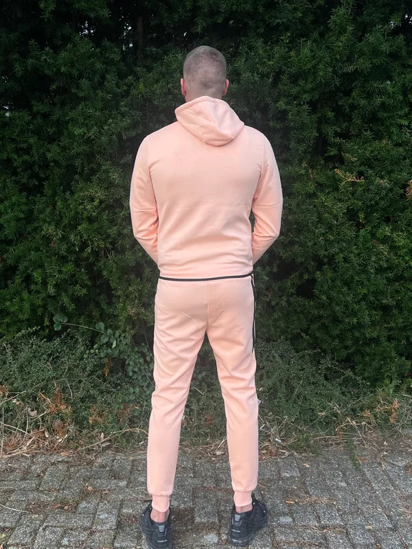 Infano Trainingspak - Licht Orange